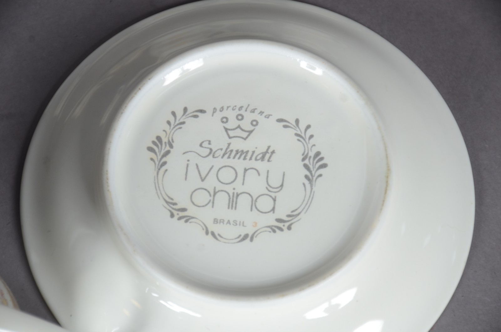 Conjunto com 11 xícaras de café com pires de porcelana Schmidt... - foto 9 de 9