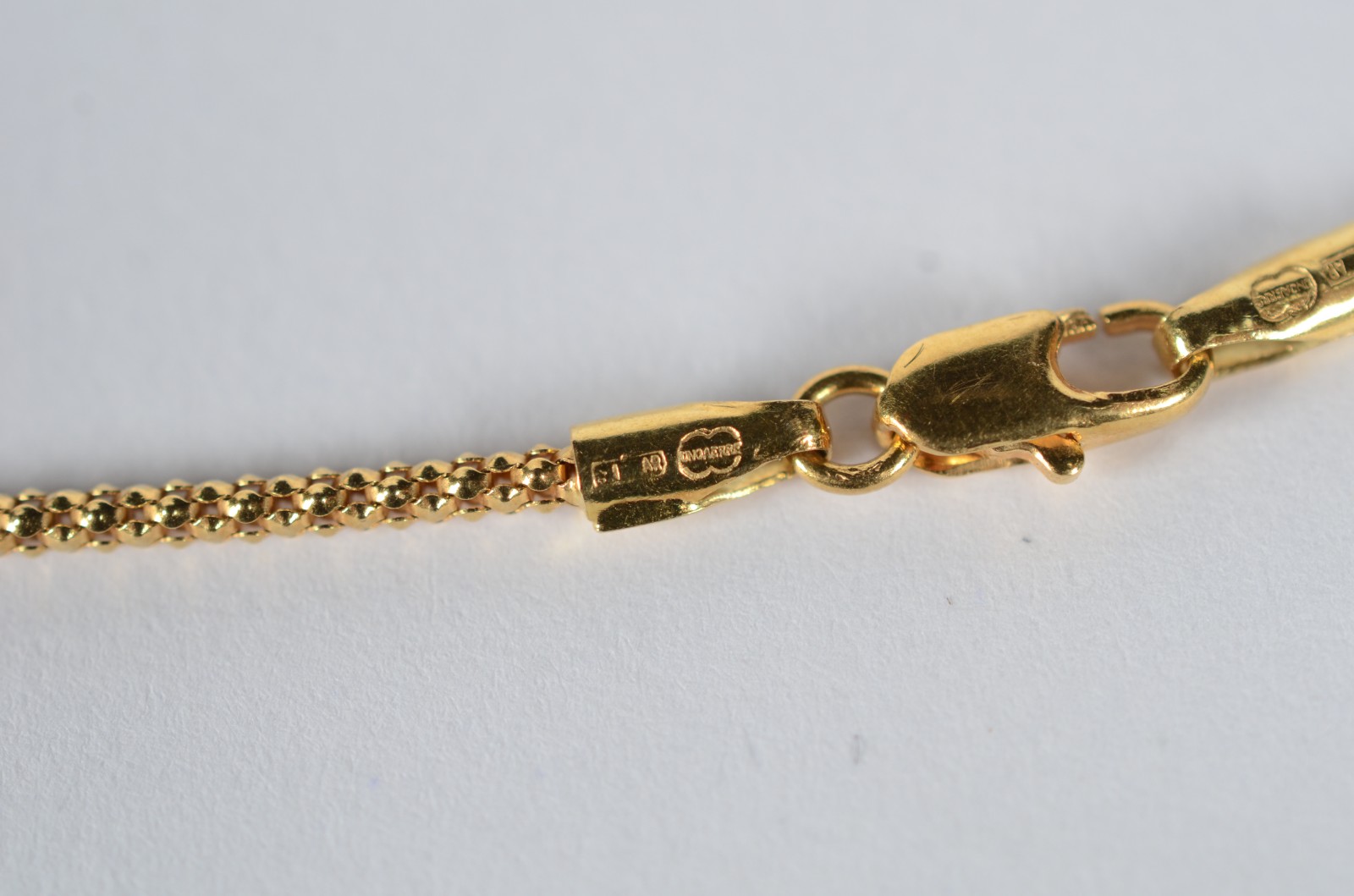 Colar de ouro 18 k., contraste 750 com pendente feitio oval em madre... - foto 5 de 7