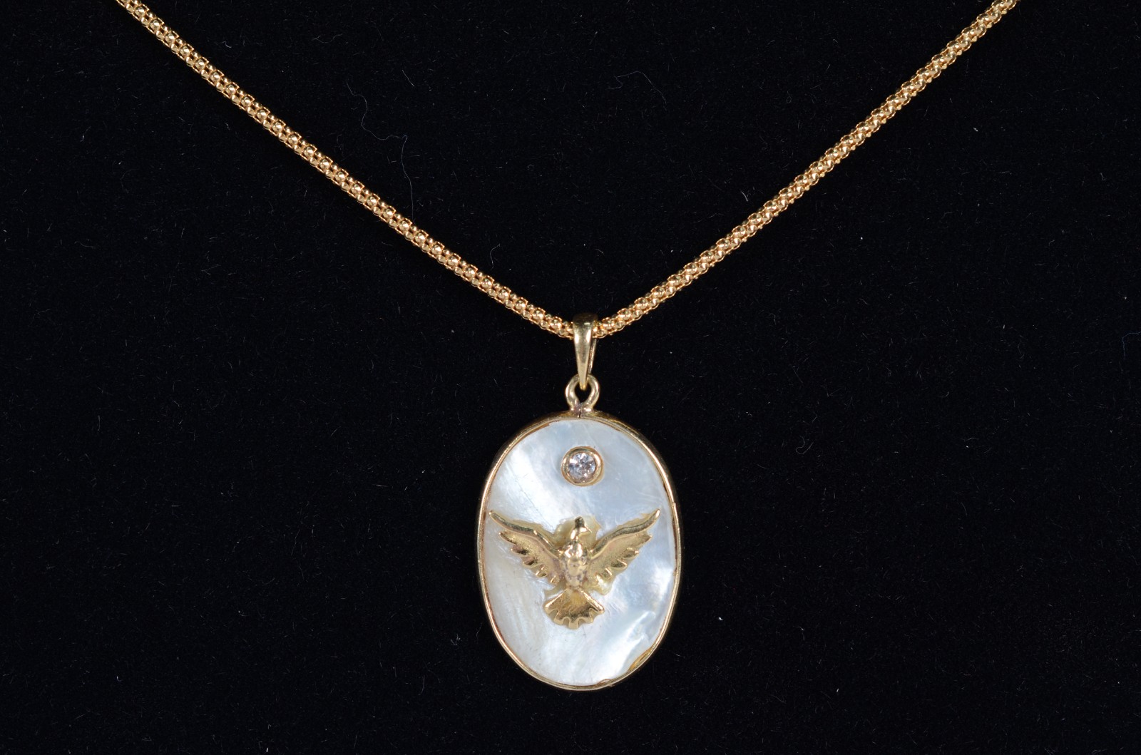 Colar de ouro 18 k., contraste 750 com pendente feitio oval em madre... - foto 7 de 7