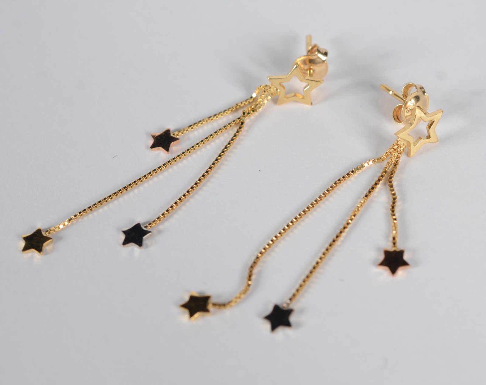 Par de brincos de ouro 18 k., contraste 750 feitio estrela. (Por... - foto 1 de 5