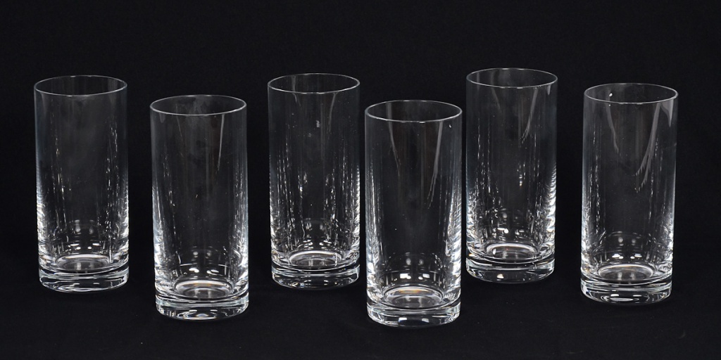 Seis copos longos de cristal liso para whisky.