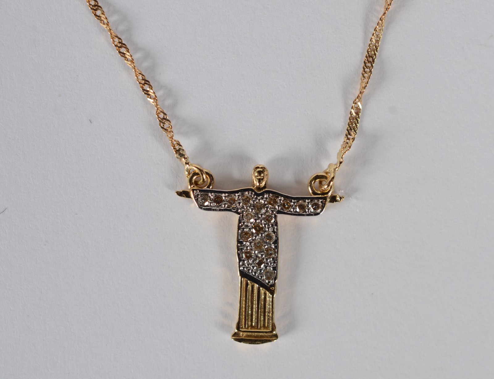 Colar com pendente de ouro 18 k., contraste 750 feitio torcido com... - foto 2 de 7