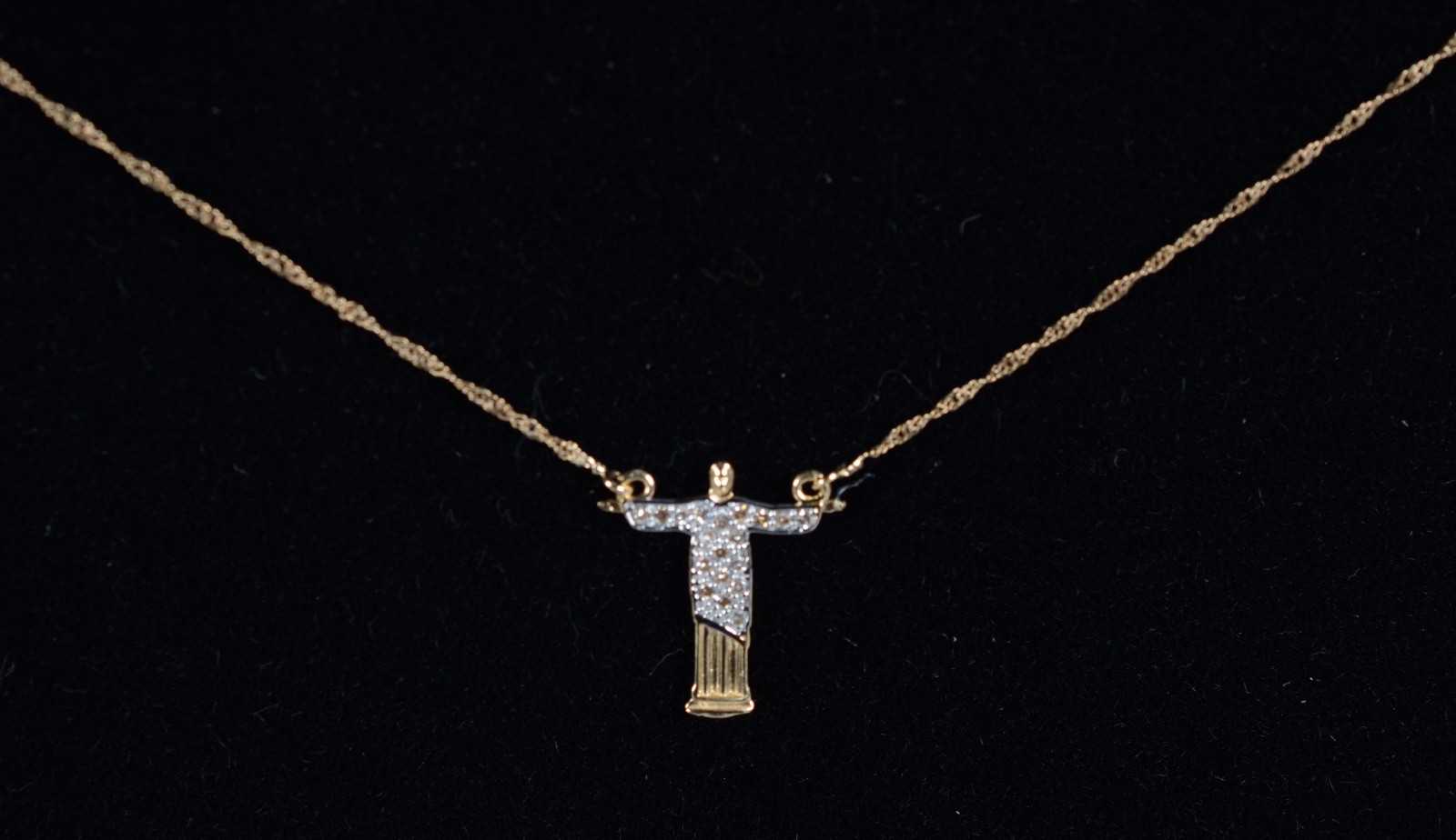 Colar com pendente de ouro 18 k., contraste 750 feitio torcido com... - foto 7 de 7