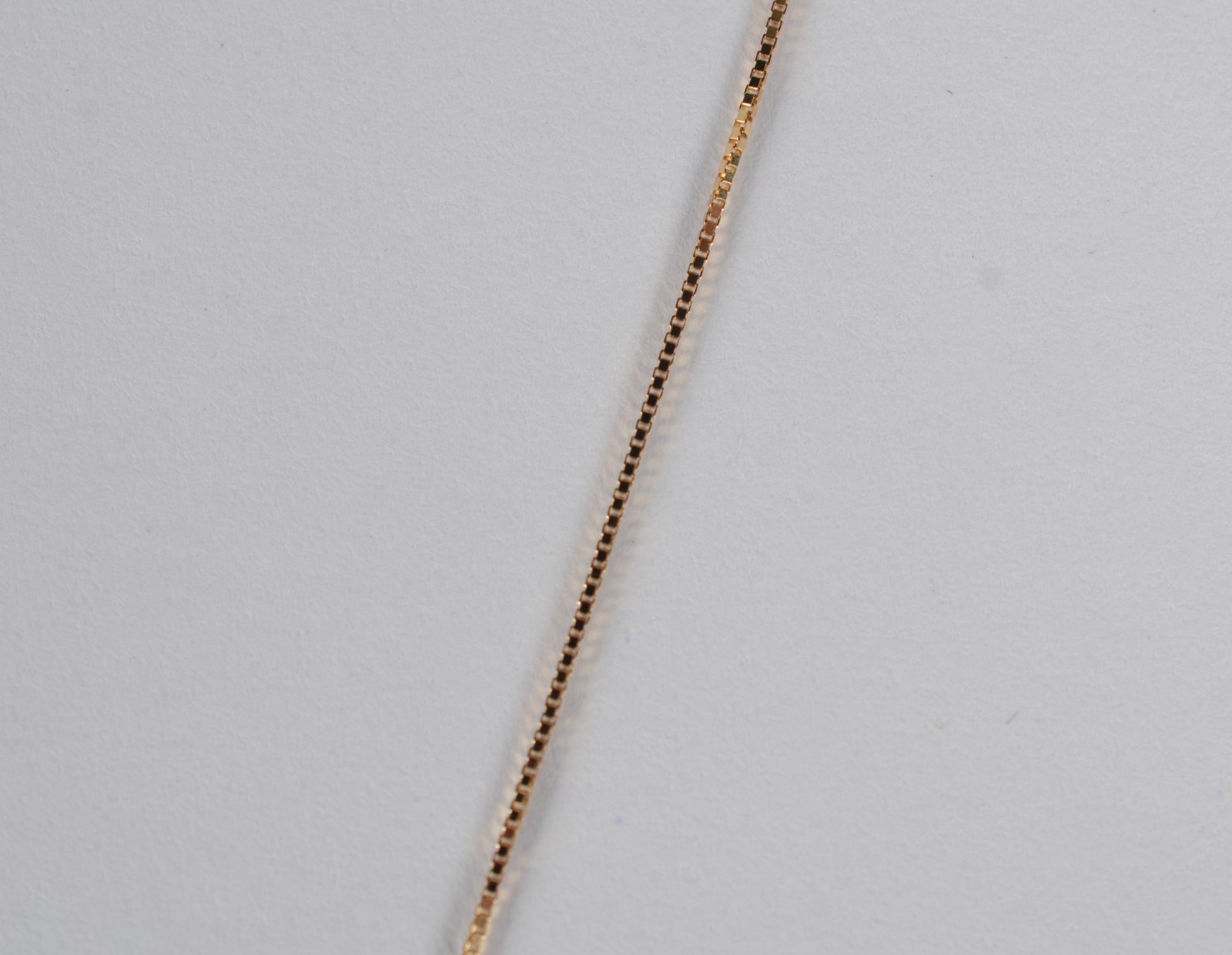 Colar com pendente de ouro 18 k., contraste 750, com brilhante e uma... - foto 4 de 8