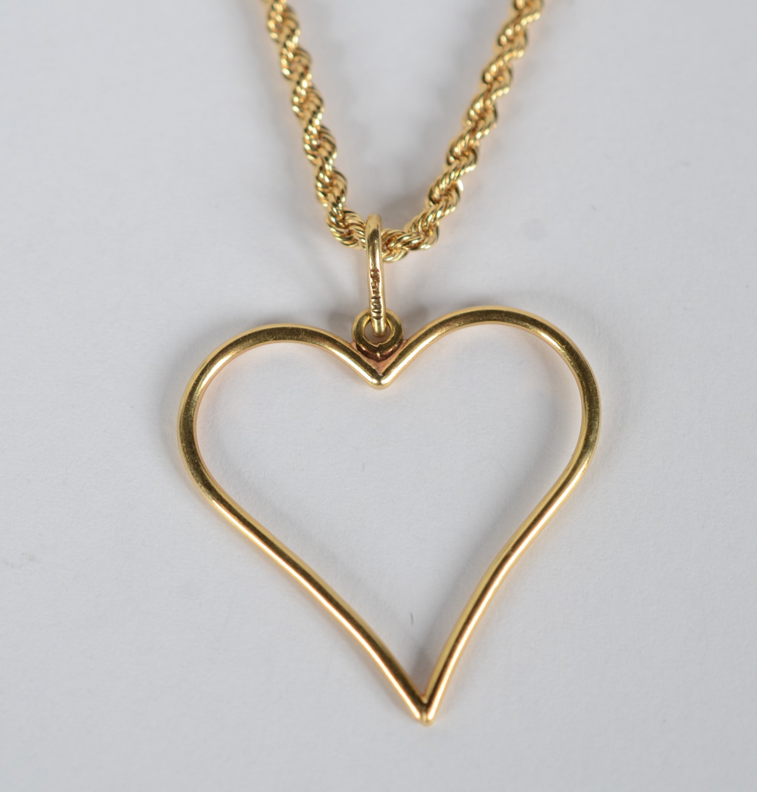 Cordão de ouro 18k., contraste 750 com pendente de coração. (Por... - foto 1 de 5