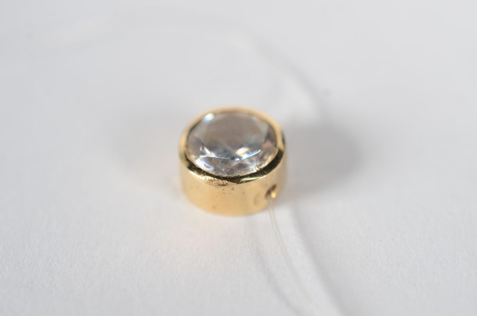 Colar de ouro 18 k., contraste 750 com pedra de luz. (Por motivos de... - foto 2 de 6