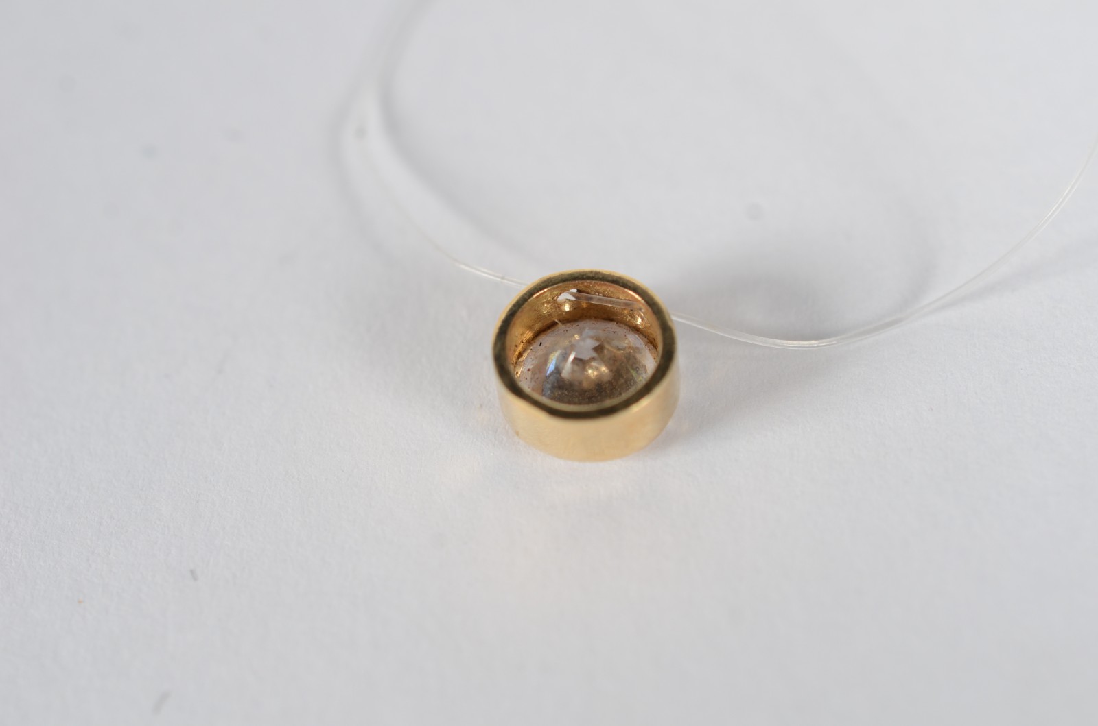 Colar de ouro 18 k., contraste 750 com pedra de luz. (Por motivos de... - foto 5 de 6