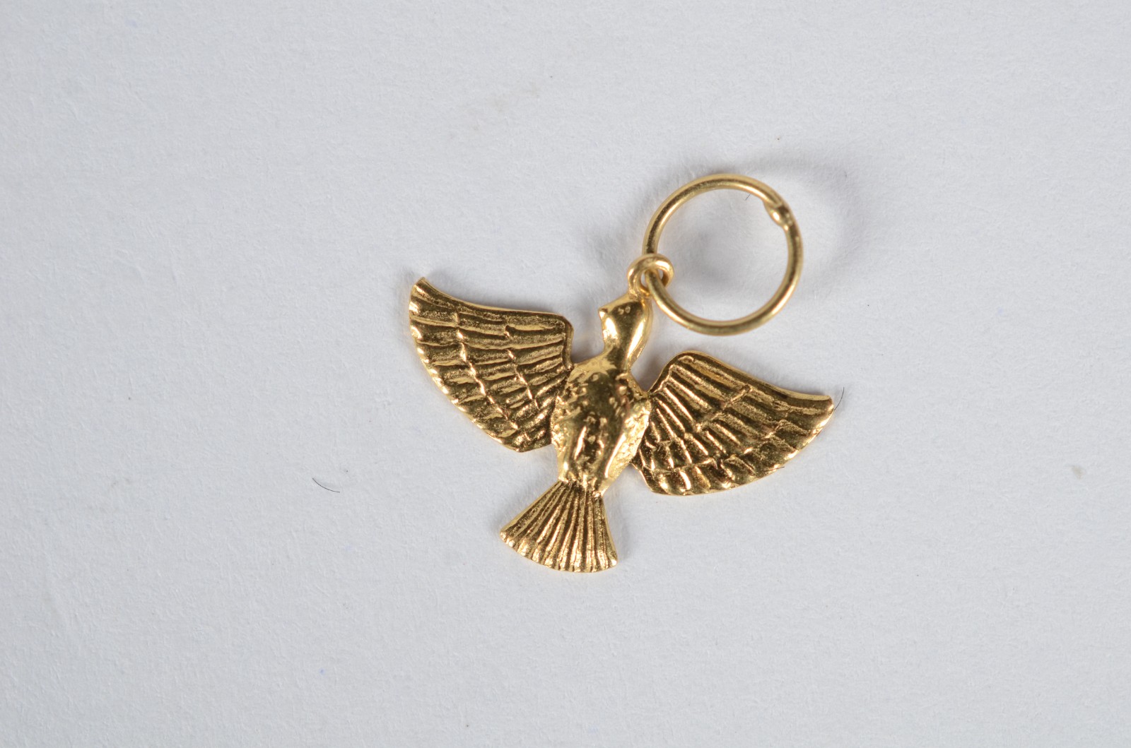 Conjunto composto de 4 pendentes de ouro 18 k., contraste 750, sendo... - foto 4 de 6