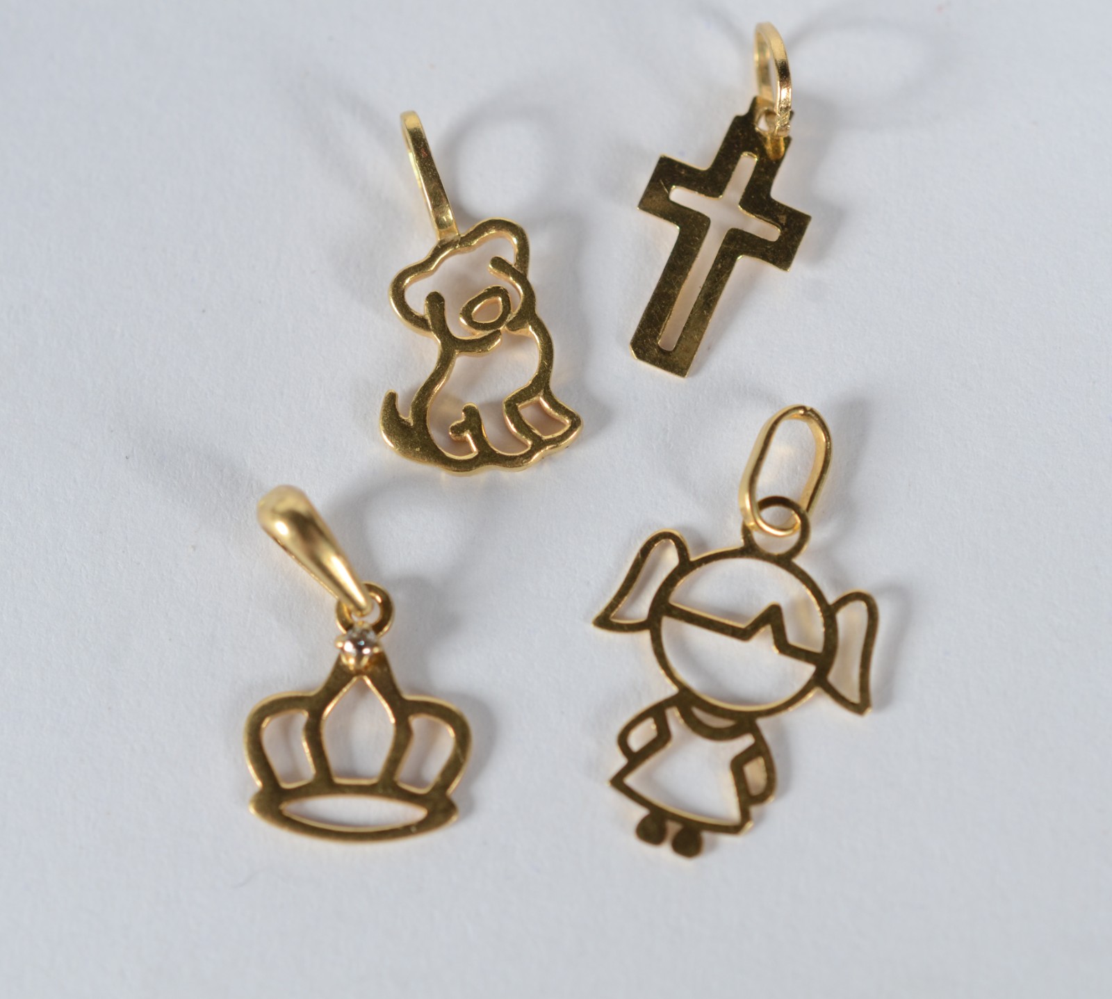 Conjunto de pendentes de ouro 18 k., contraste 750, sendo: cachorro... - foto 3 de 3