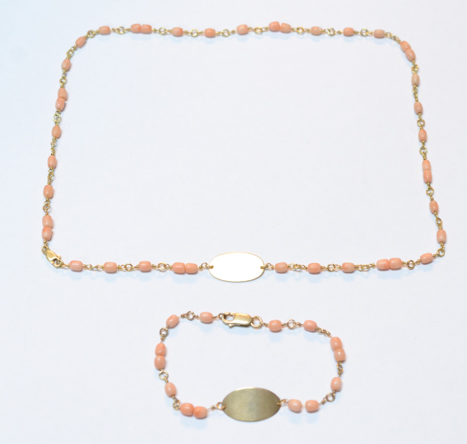 Conjunto de pulseira e colar de ouro com pedras cor de coral. (Por... - foto 2 de 6