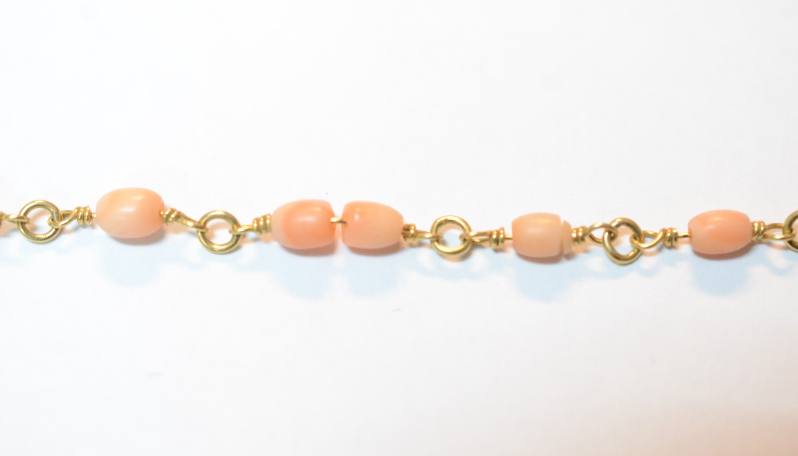 Conjunto de pulseira e colar de ouro com pedras cor de coral. (Por... - foto 3 de 6