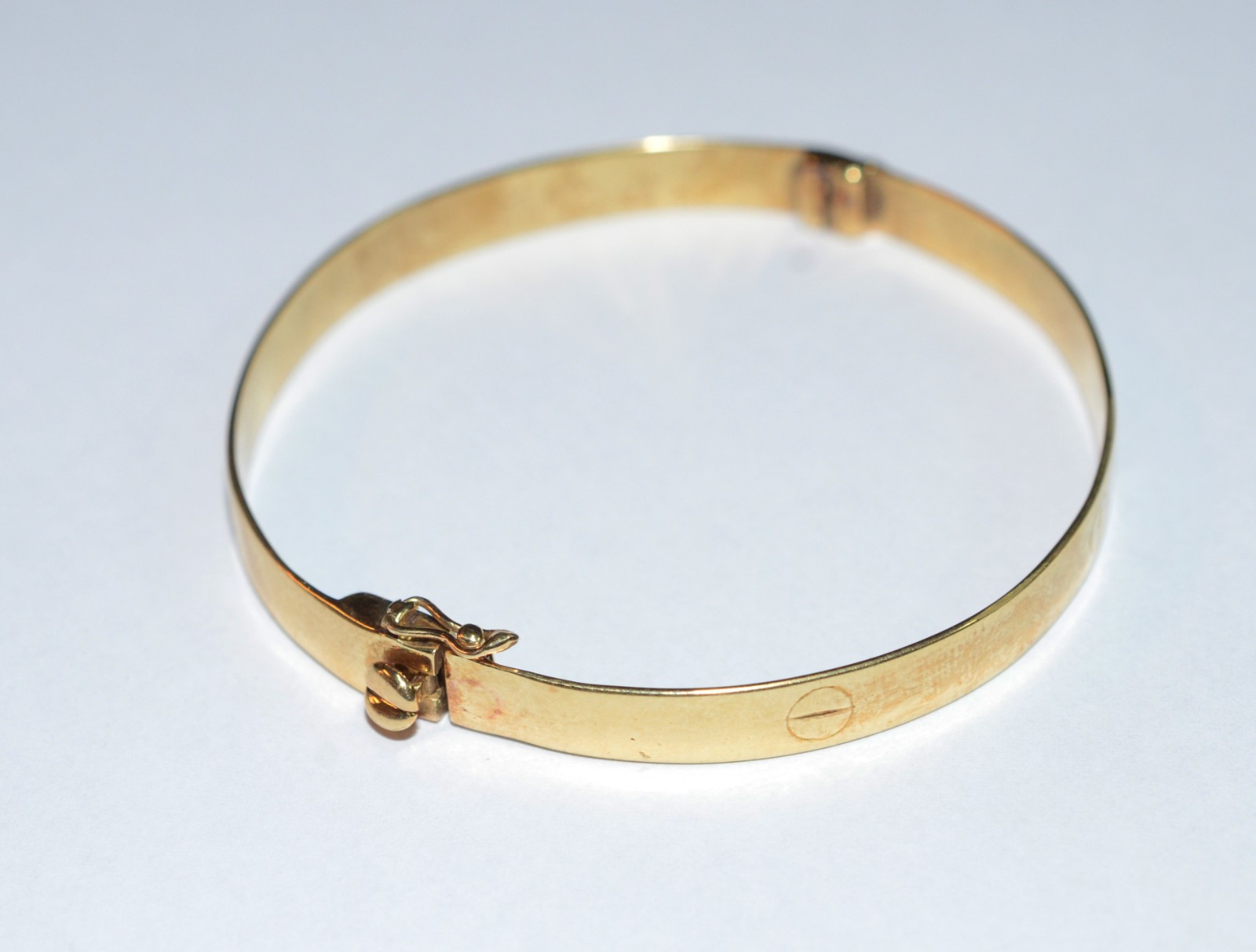 Pulseira algema de ouro 18 k. (Por motivos de segurança a peça não se... - foto 1 de 6