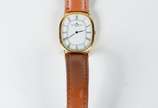 Baume & Mercier (1830),  - Relógio de pulso, caixa de metal dourado, números romanos. Com certificado.