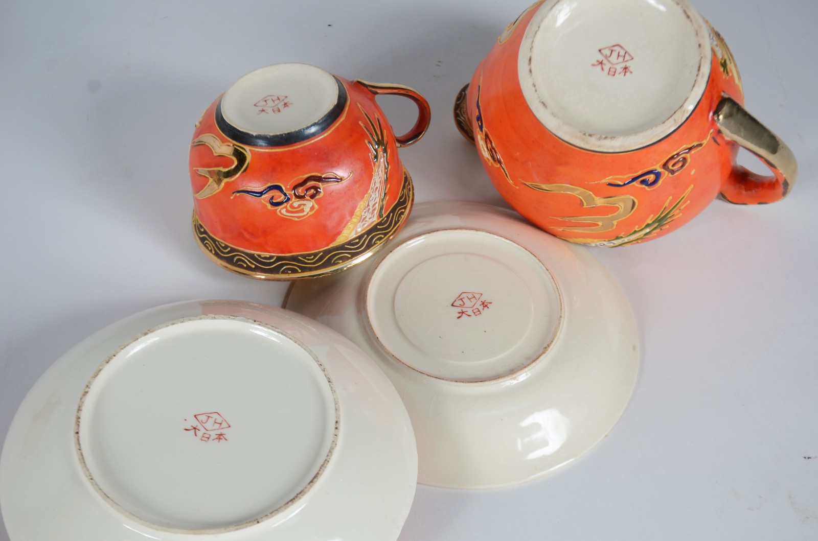 Serviço de chá de porcelana oriental, decorado com dragões sobre... - foto 9 de 11