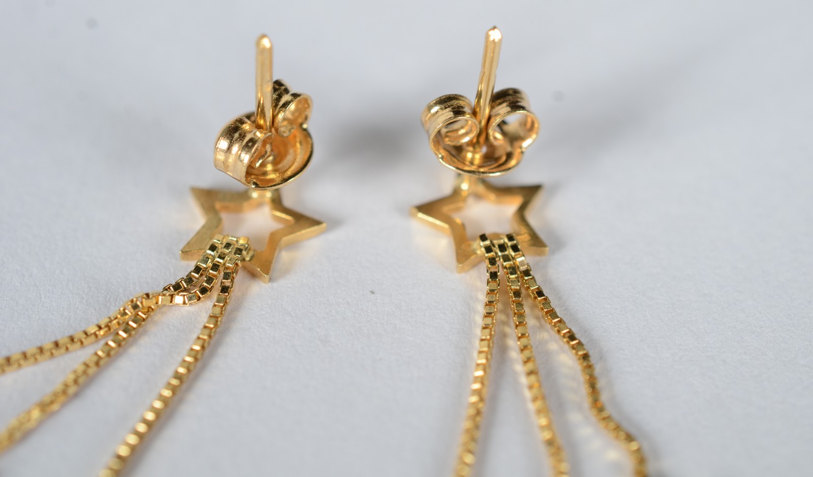 Par de brincos de ouro 18 k., contraste 750 feitio estrela. (Por... - foto 5 de 6