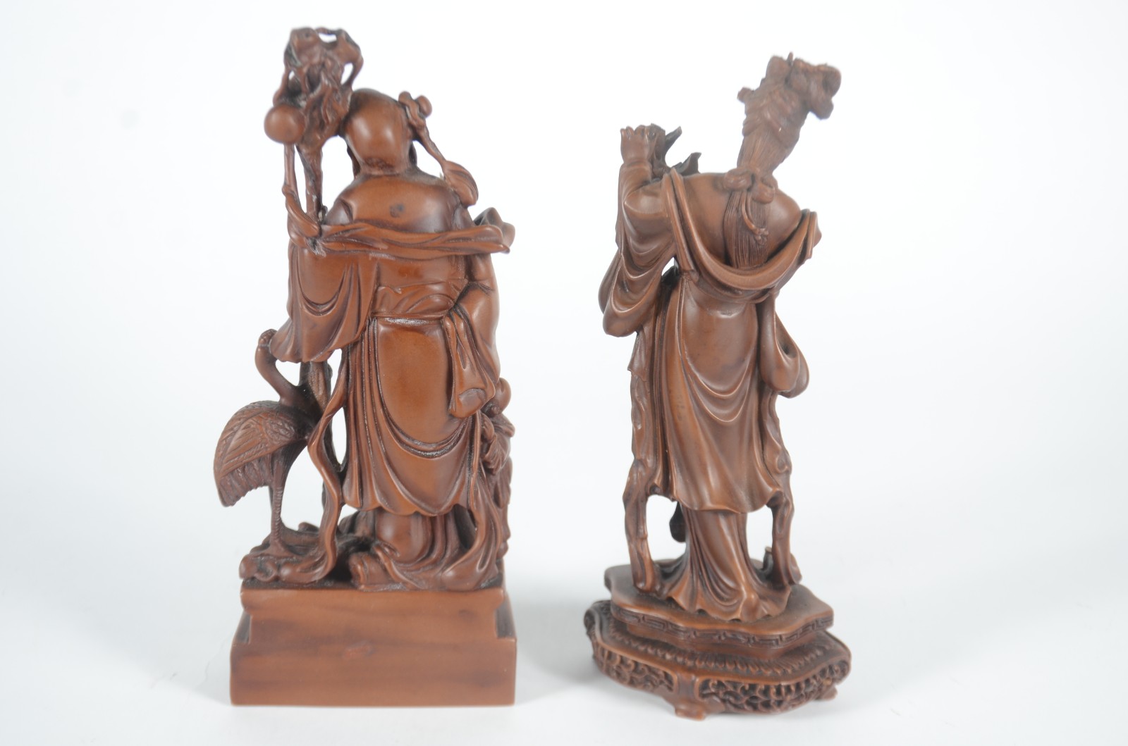 Três estatuetas orientais diversas de resina, sendo: Shou Xing, o... - foto 7 de 10