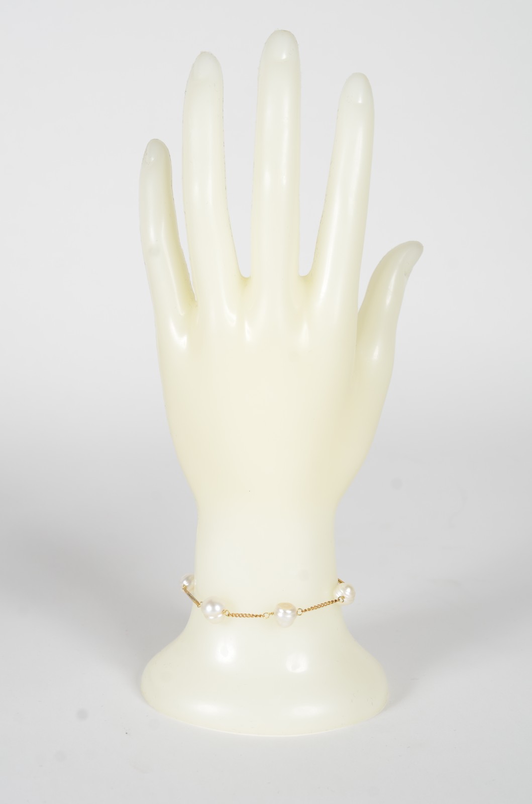 Pulseira de ouro 18 k., perolas intercaladas. (Por motivos de... - foto 7 de 7