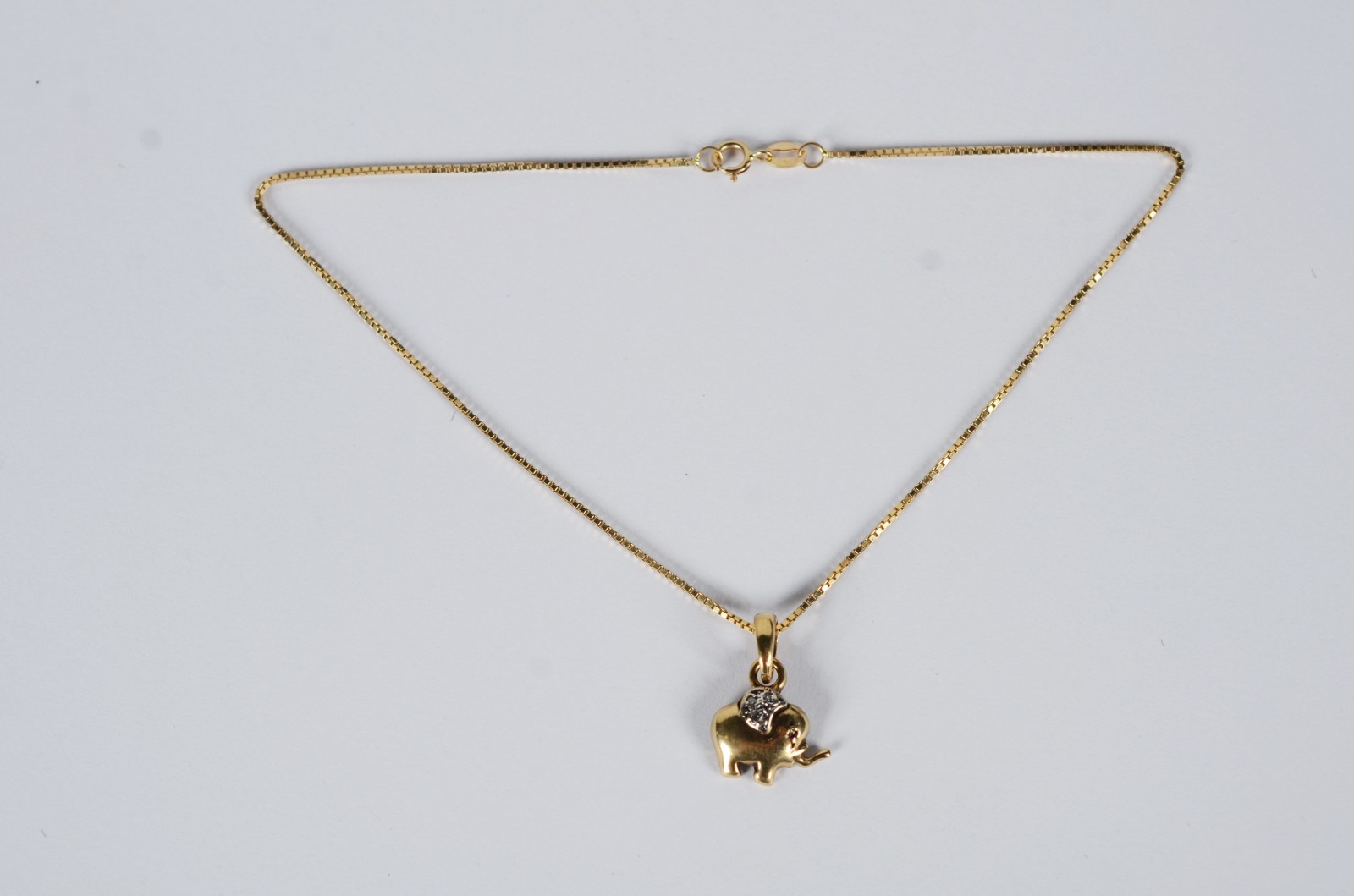 Tornozeleira de ouro 18 k., contraste 750 com pendente. (Por motivos... - foto 2 de 8