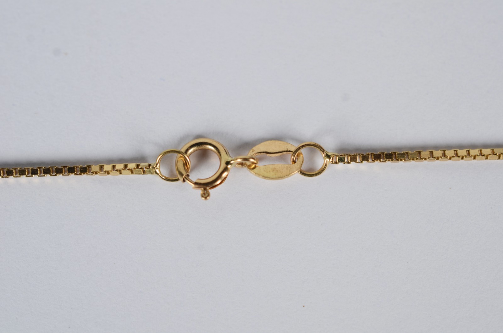 Tornozeleira de ouro 18 k., contraste 750 com pendente. (Por motivos... - foto 4 de 8