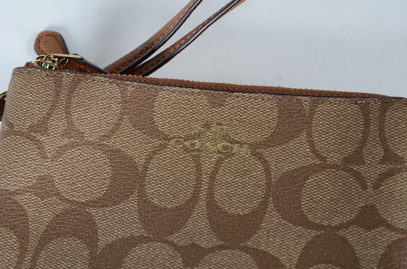 Três bolsas porta níquel, marca COACH. - foto 5 de 11