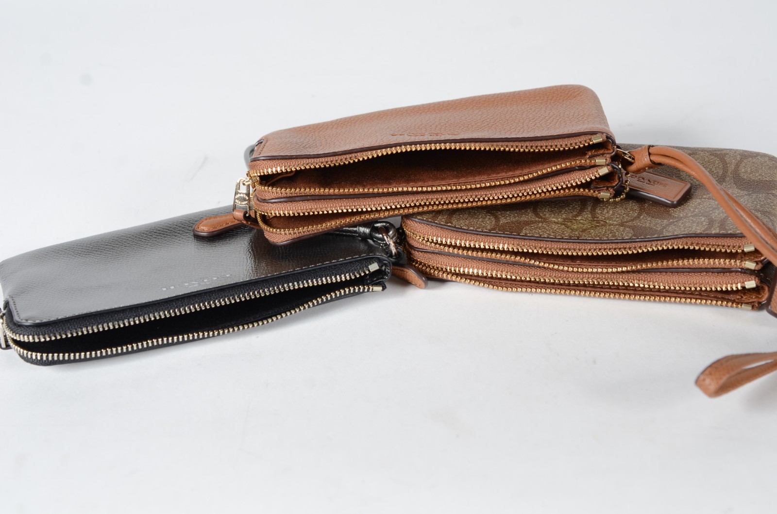 Três bolsas porta níquel, marca COACH. - foto 6 de 11