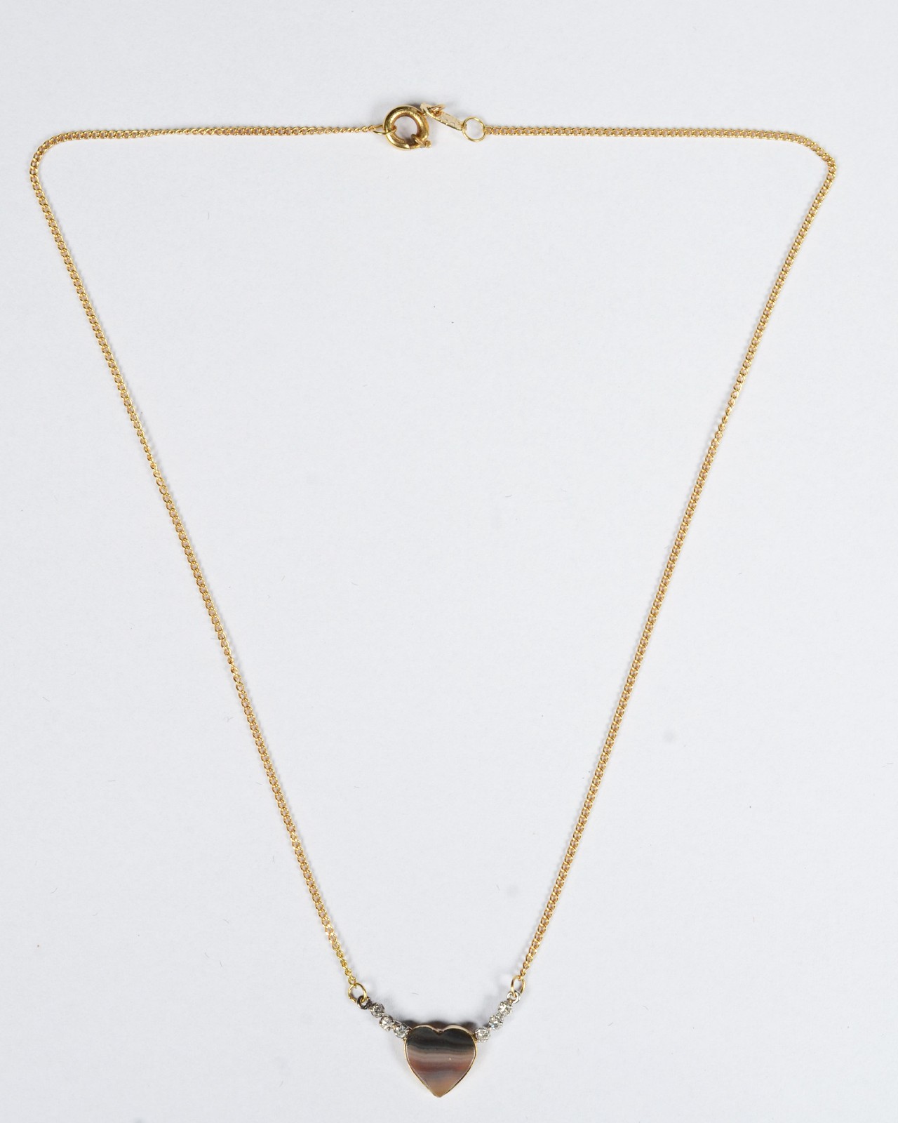 Colar de ouro 18 k., contraste 750 com pendente feitio coração com... - foto 2 de 7