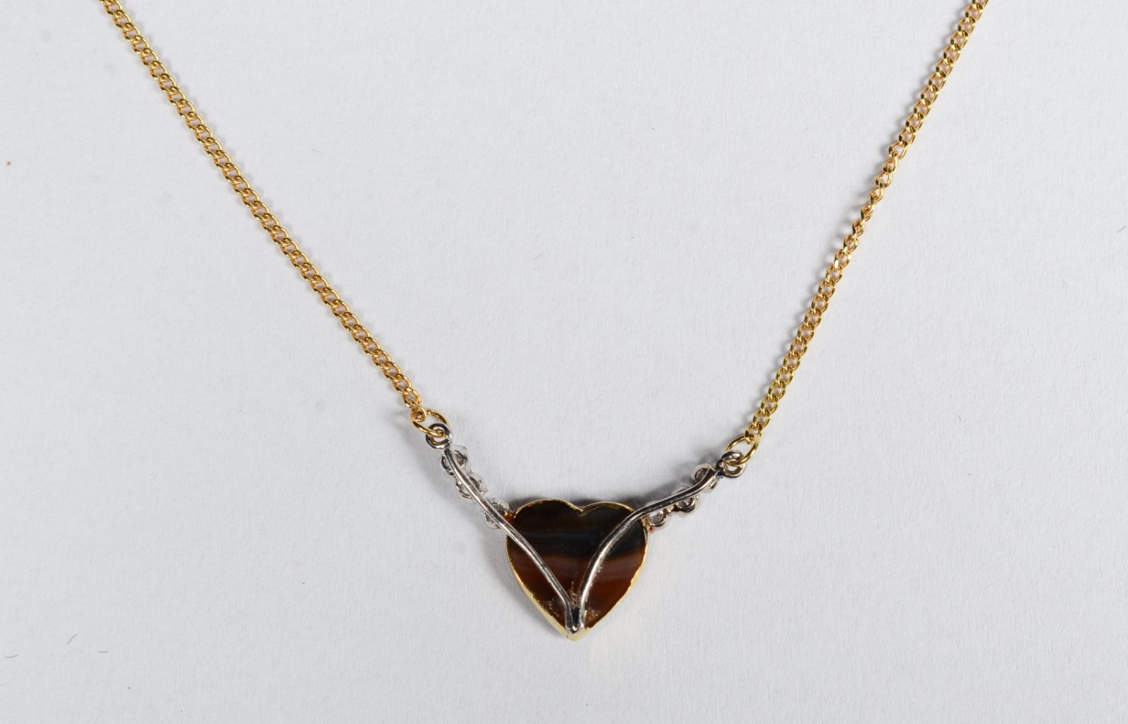 Colar de ouro 18 k., contraste 750 com pendente feitio coração com... - foto 5 de 7