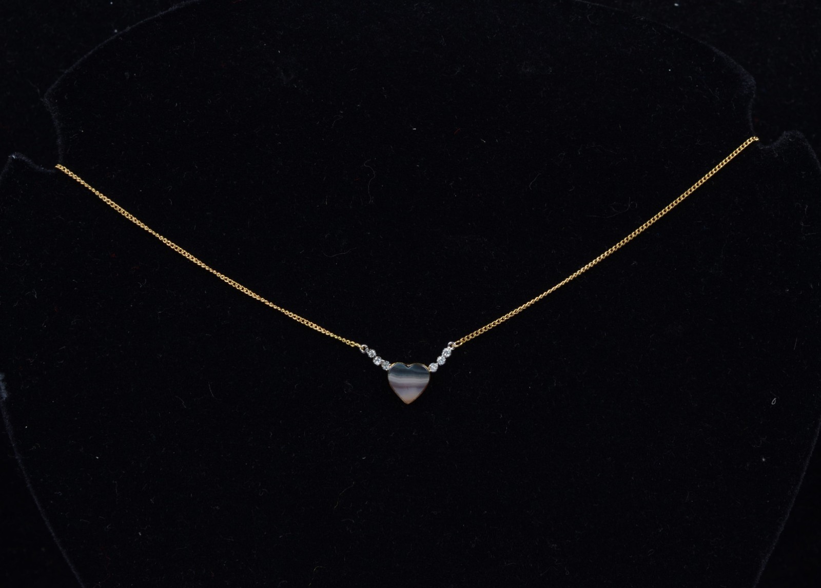 Colar de ouro 18 k., contraste 750 com pendente feitio coração com... - foto 7 de 7