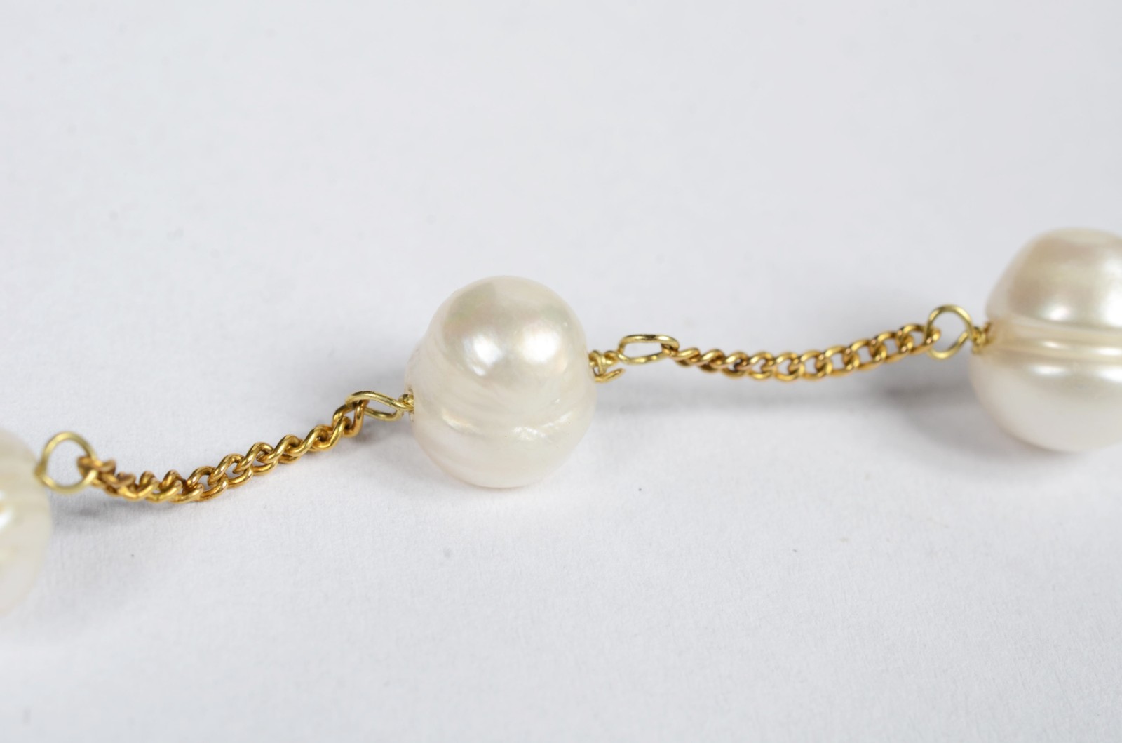 Pulseira de ouro 18 k. com 6 pérolas brancas intercaladas de... - foto 5 de 5