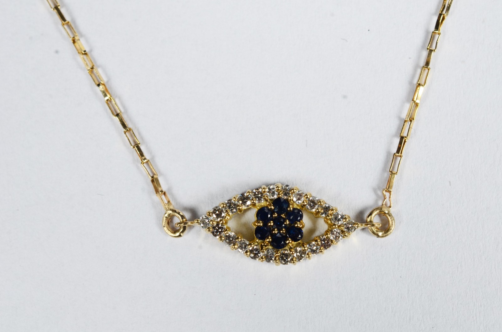 Colar de ouro 18 k., contraste 750 feitio, pendente com safiras e... - foto 3 de 7