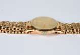 Omega (1848),  - Relógio Omega de pulso com caixa e pulseira de ouro 18 k. (Por motivos de segurança a peça não se encontra na loja).<br><br>