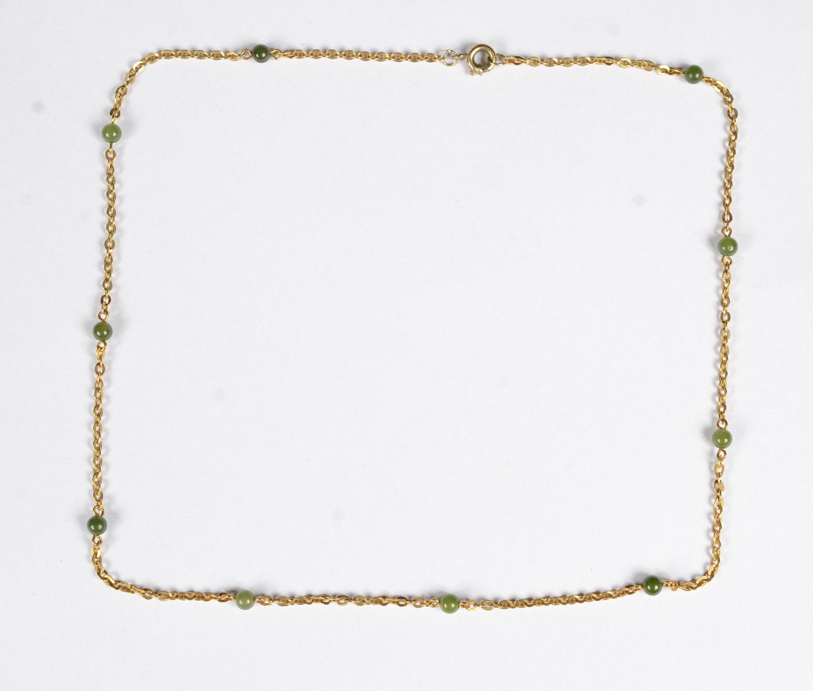 Colar de ouro 18 k com pedras verdes. (Por motivos de segurança a... - foto 1 de 5