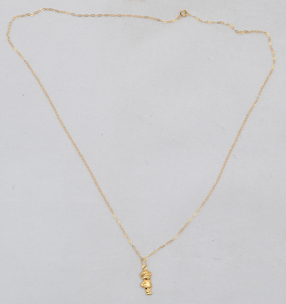 Gargantilha em ouro amarelo 18 k com pingente representando criança... - foto 2 de 2