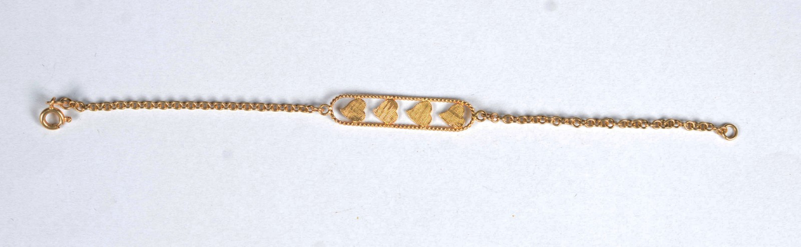 Pulseira de ouro 18 k., placa com 4 corações esmaltados. (Por motivos... - foto 5 de 6