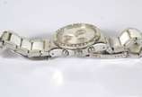 Swatch,  - Relógio feminino de pulso, á quartz. Com desgastes e faltando uma pedra.
