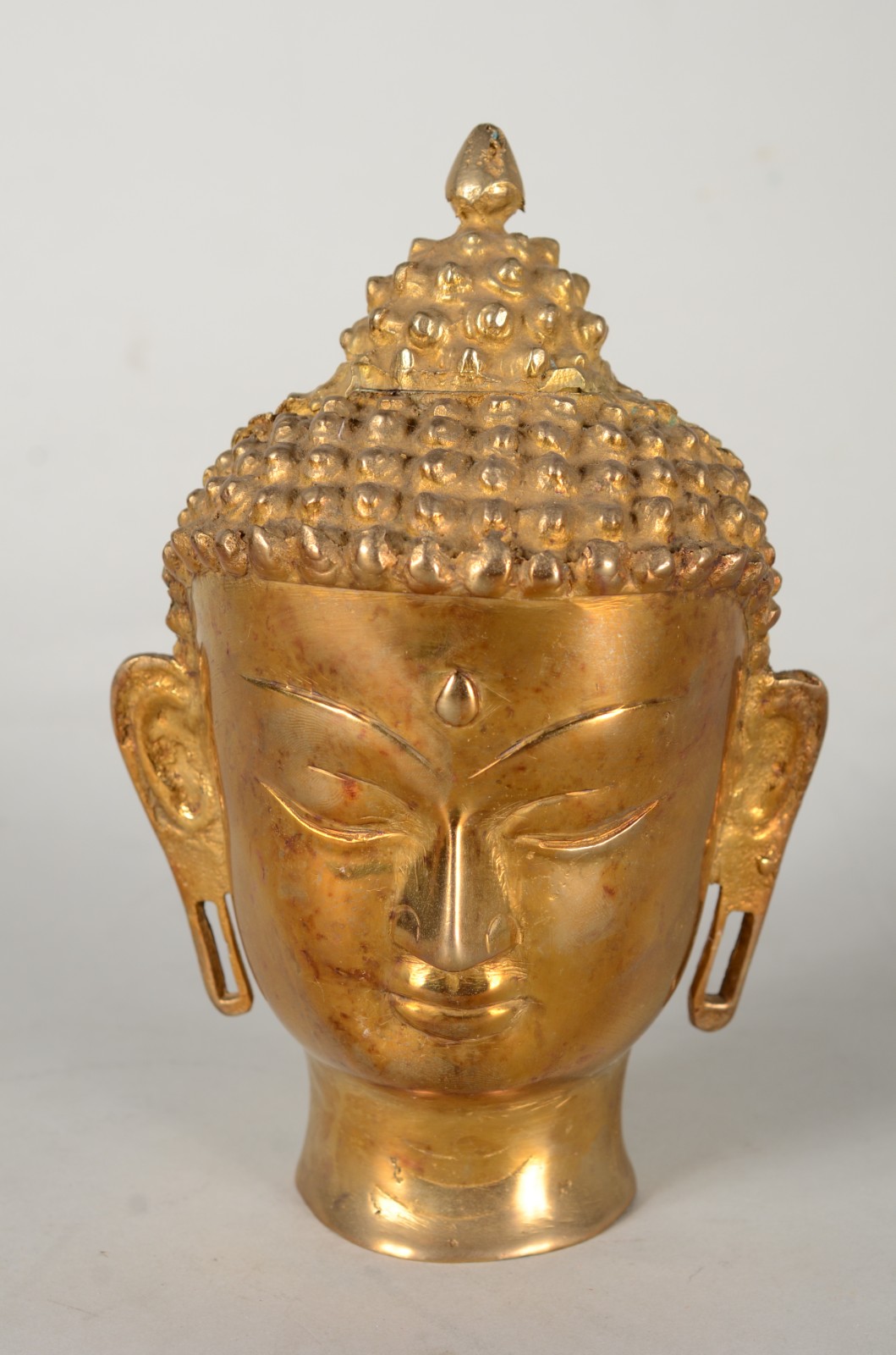 Cabeça de bronze representando Buda. - foto 1 de 6