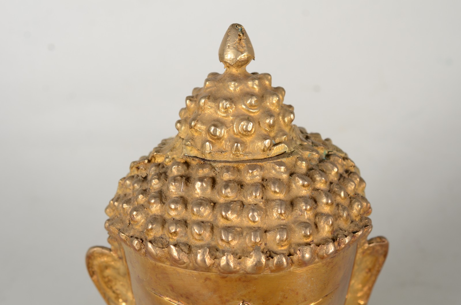 Cabeça de bronze representando Buda. - foto 3 de 6