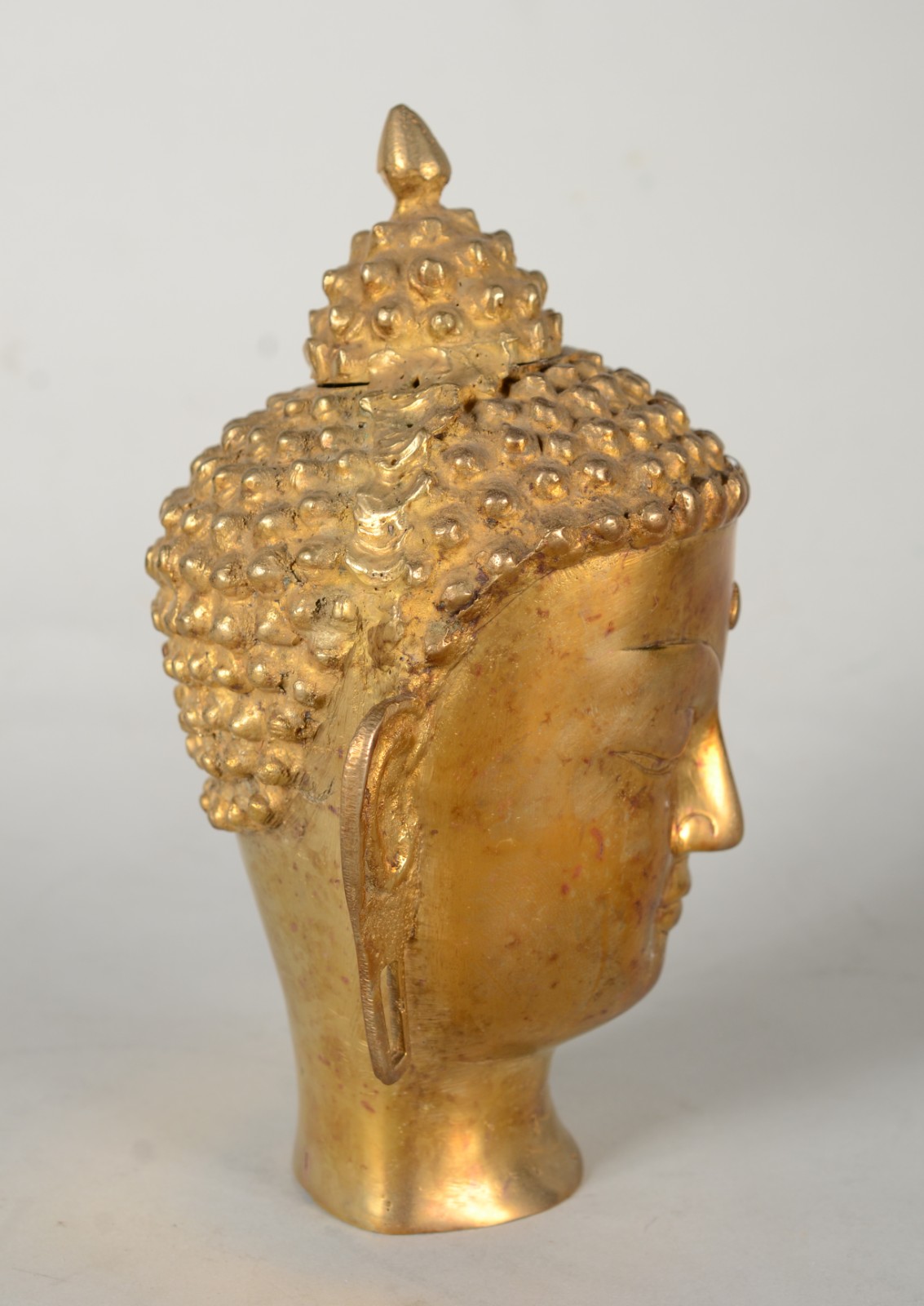 Cabeça de bronze representando Buda. - foto 4 de 6