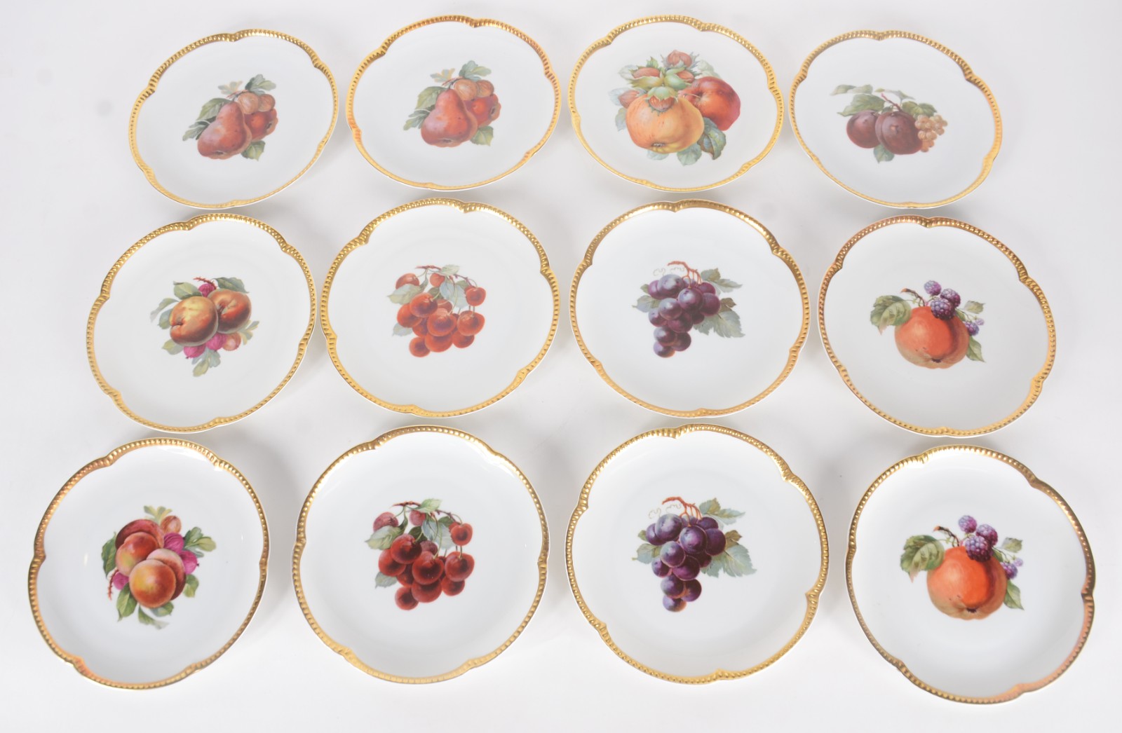 Conjunto com doze pratos para sobremesa de porcelana alemã da... - foto 1 de 11