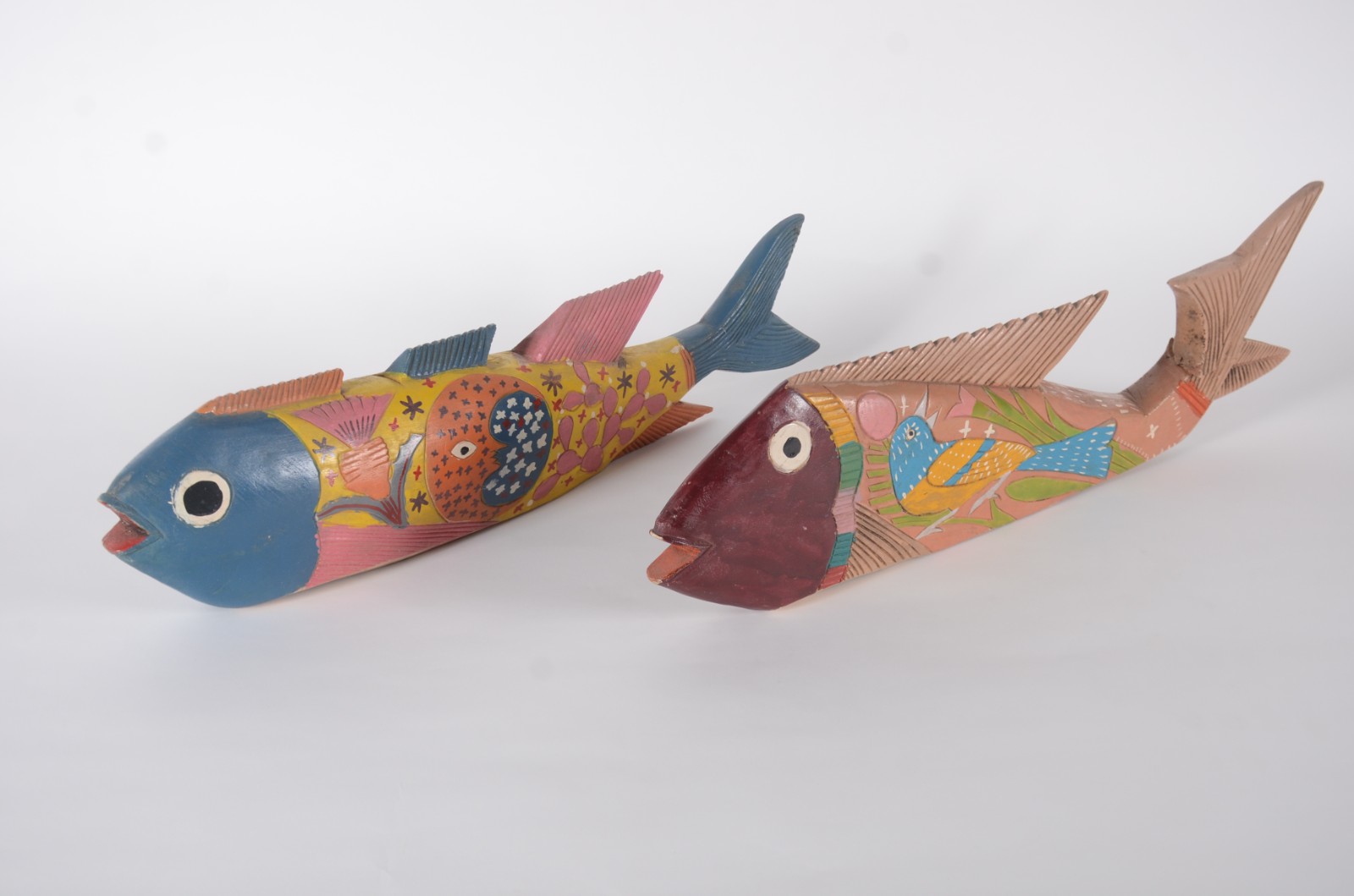 Par de peixes decorativos de madeira mexicana, (pequenos quebrados). - foto 1 de 11