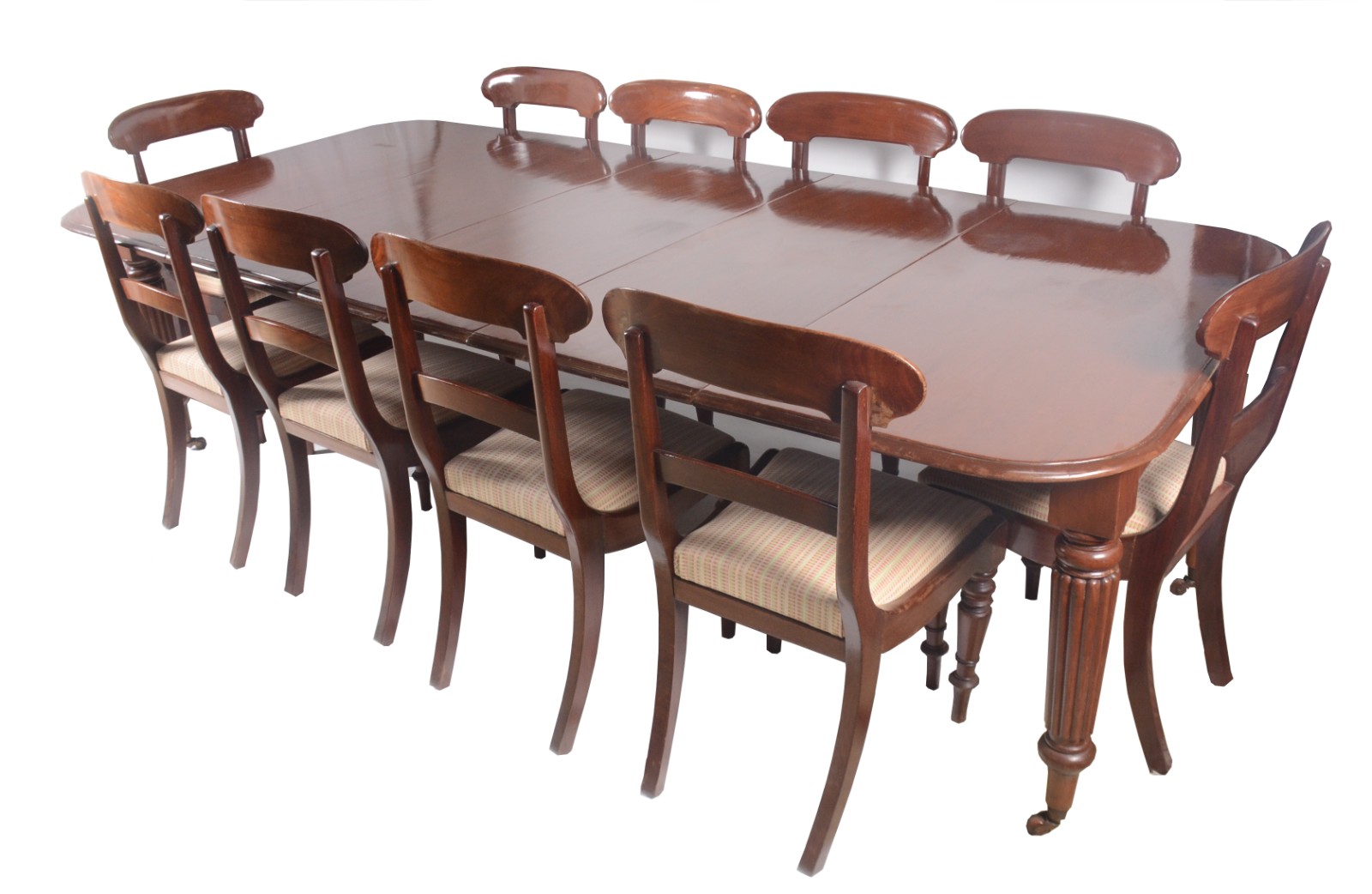 Mesa de jantar de madeira nobre, pernas cilíndricas frisadas sobre... - foto 1 de 11