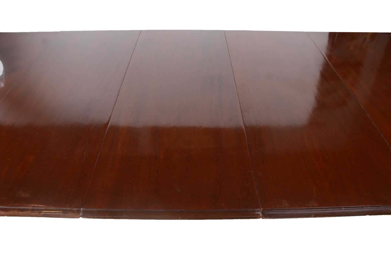 Mesa de jantar de madeira nobre, pernas cilíndricas frisadas sobre... - foto 5 de 11