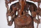 Estatueta de madeira oriental entalhada represe... - Estatueta de madeira oriental entalhada representando Ganesha.