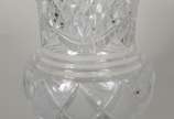 Quatro peças diversas de cristal lapidado, send... - Quatro peças diversas de cristal lapidado, sendo dois bowls, vaso para flores e bomboniere com tampa.