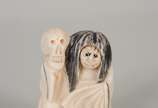 NETSUKE,  - Netsuke de marfim tendo rosto giratório com faces diferentes, personagem do teatro Kabuki. Assinado.