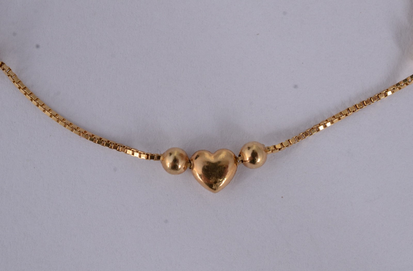 Pulseira infantil de ouro 18 k., de bolinhas e coração. (Por motivos... - foto 3 de 5