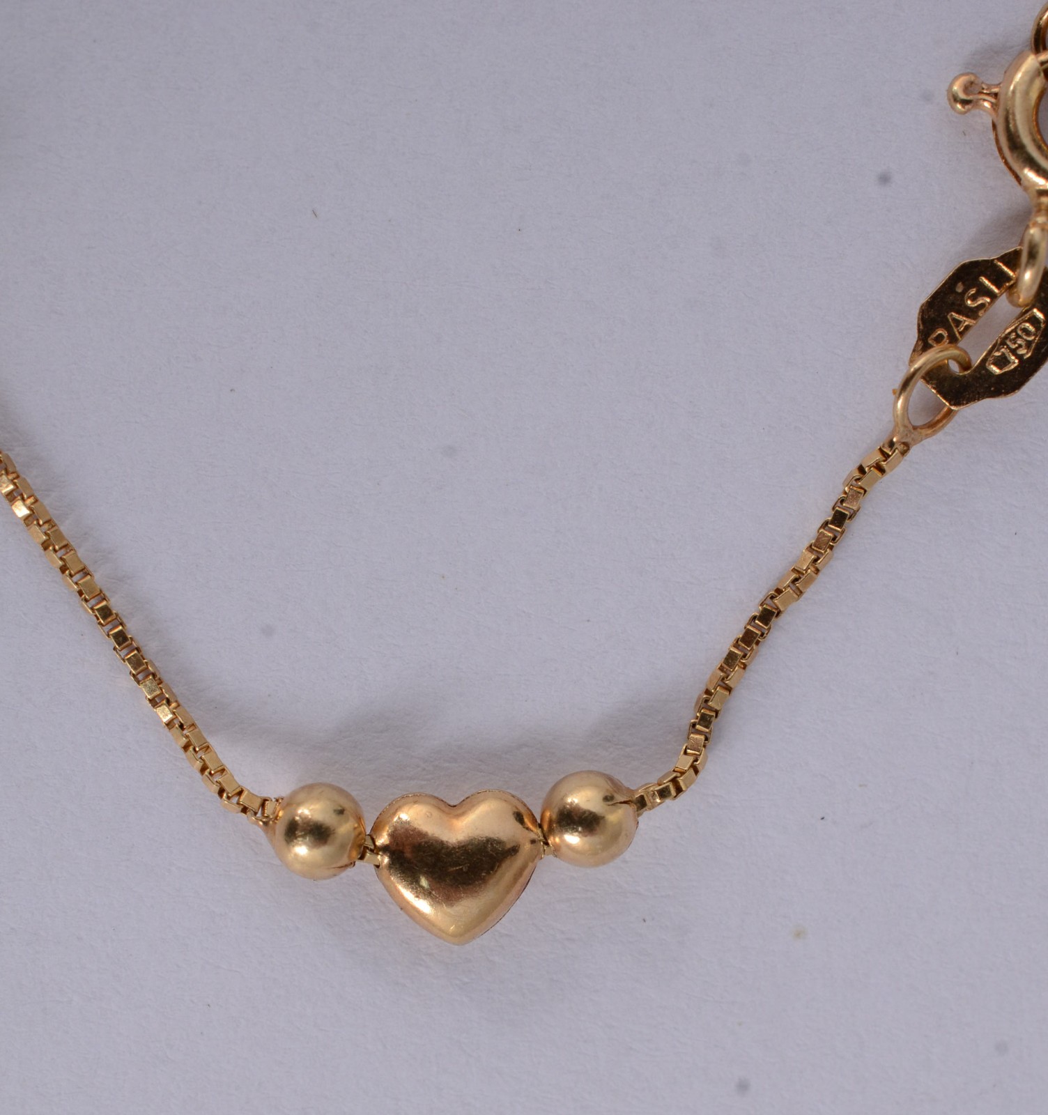 Pulseira infantil de ouro 18 k., de bolinhas e coração. (Por motivos... - foto 5 de 5