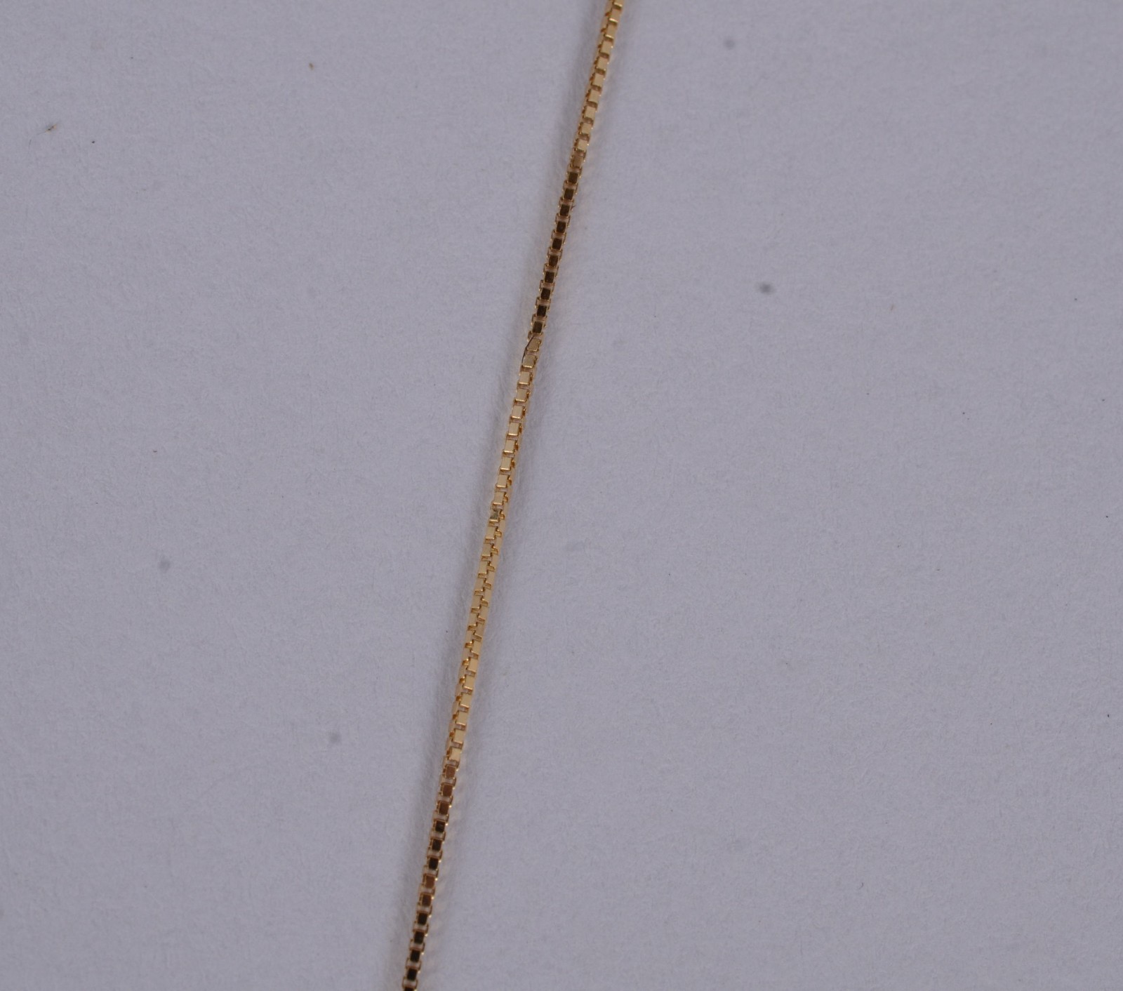 Colar de ouro amarelo 18 k., contraste 750mls com crucifixo. (Por... - foto 6 de 7