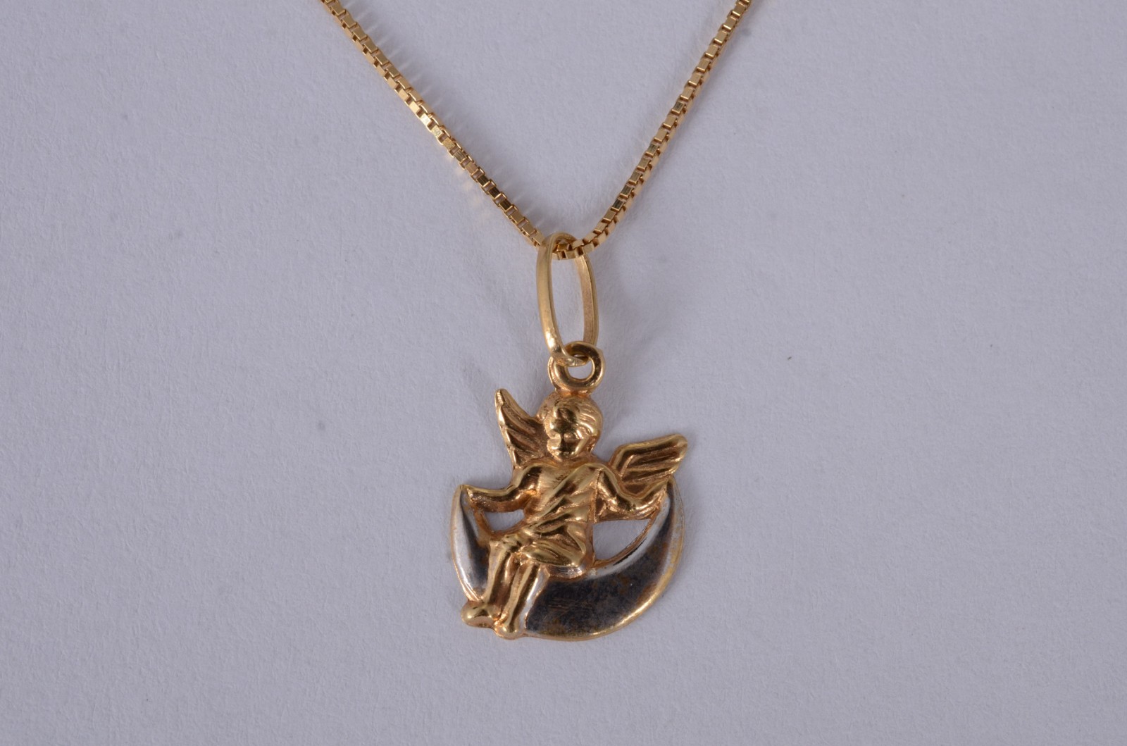 Colar de ouro amarelo 18 k., contraste 750mls e pingente... - foto 2 de 6