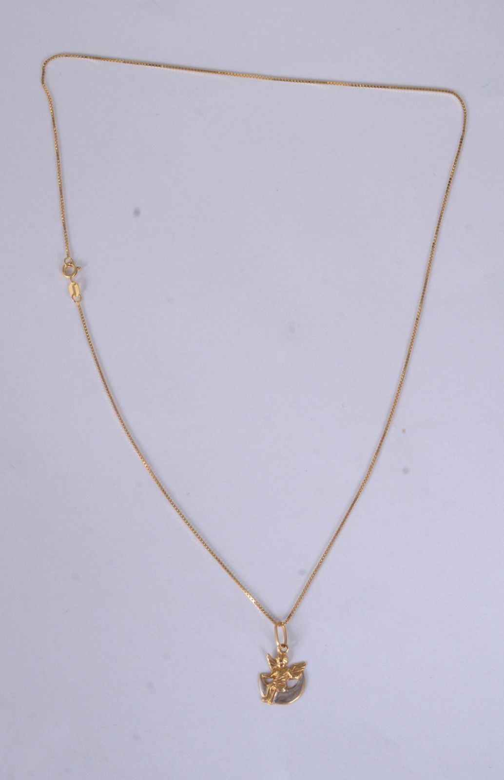 Colar de ouro amarelo 18 k., contraste 750mls e pingente... - foto 3 de 6